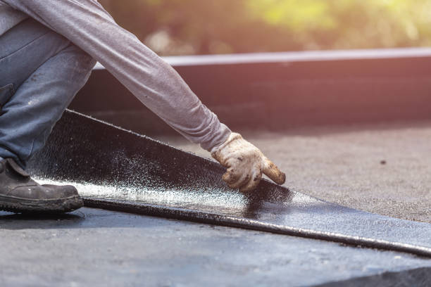 Professional Basement Waterproofing technician working in Peachtree City, GA
